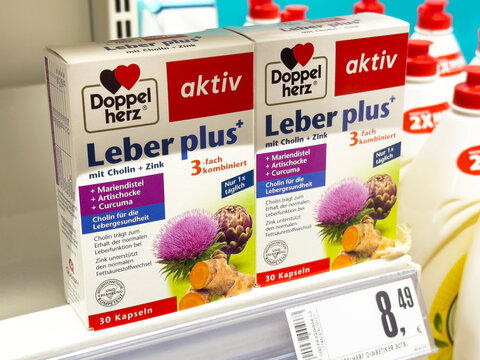 Ljubljana, Slovenia - June 03, 2025: Doppelherz Leber plus dietary supplement boxes displayed on a store shelf, showcasing health benefits and vibrant packaging design for wellness enthusiasts