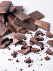 Chunk of cacoa mass bar or cocoa liquor. 100% pure cocoa chocolate.