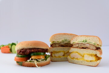 Chicken patty burger with some veggies