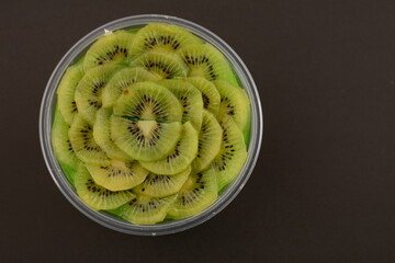 Top view of  kiwi pudding with some pieces of kiwi on it