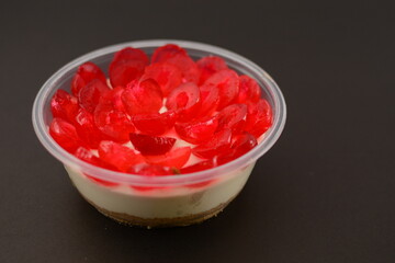 jelly pudding with some pieces of jelly on it