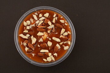 Top view Chocolate pudding with some almonds on it