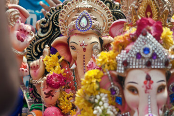 Fototapeta premium Vadodara, Gujarat / India - September 27, 2015 : Closeup of a beautiful statue of the Lord Shree Ganesha on the day of the Ganesha festival.