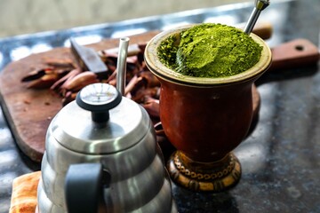 Brazilian winter tradition, yerba mate chimarrão with roasted pine nuts and bergamot