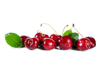Ripe juicy cherry with  leaves isolated on white background.