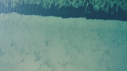 An aerial view of algae in a pond.
