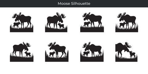 Obraz premium Black moose silhouette showing a parent and calf standing in a natural environment