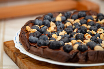 Healthy Chocolate Cake with Blueberries and Hazelnuts