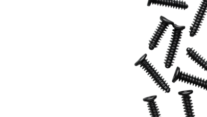 Black screws falling against a black background