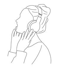 woman listening to music with headphones