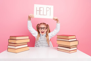 Cheerful student asking for help in education while surrounded by book in cute uniform and pink...
