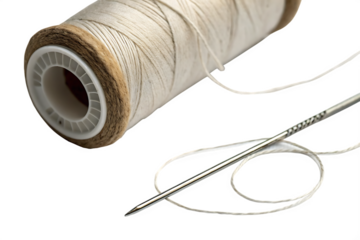 needle and-thread are-shown-next to-a-spool  isolated on white background png, ai generated