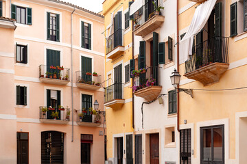 The architectural charm of Palma de Mallorca in the Balearic Islands, captured in these colorful...