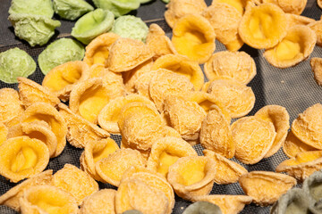 Typical homemade ear-shaped noodles or pasta from the city of Bari, Italy. Noodles made by Bari's...
