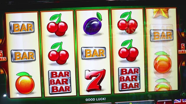 Casino slot machine screen with colorful fruit symbols like lemons, plums, oranges, cherries and red lucky number seven