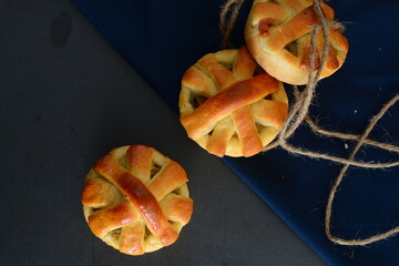 Delicious chicken bread on the dark background