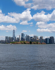 Obraz premium NYC, New York City Skyline with dramatic sky clouds. New York Skyscrapers. New York City skyline, cityscape of Manhattan in USA. Panoramic view on Manhattan. New York skyline.