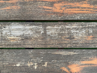 Close up of weathered and rustic solid wood texture with exposed pores and skin. Wooden deck and...