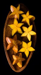 Star Fruit Slices on Wooden Tray
