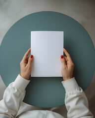 Pair of Hands Holding a Blank White Document on a Green Table
