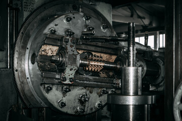 Components and parts of an old milling machine. Industrial metalworking