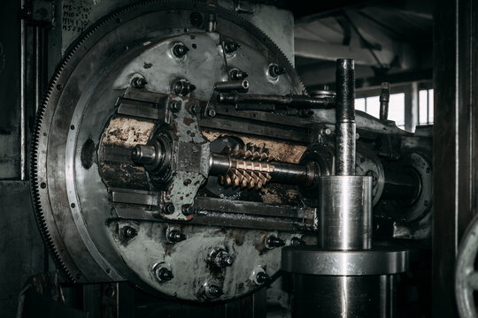 Components and parts of an old milling machine. Industrial metalworking