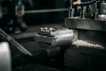 A lathe cutter in close-up. Soft focus