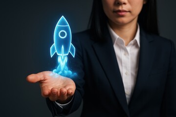 Business woman holding holographic rocket startup concept