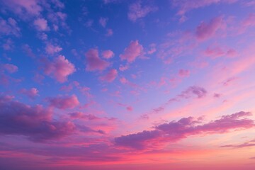 Obraz premium Pastel Cloudscape at Sunset. Serene Sky with Pink and Blue Hues