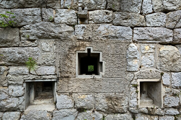 Fort Brusafer, Austro-Hungarian historical site of the Great War: rifle and machine gun embrasures. Valsorda, Trento, Trentino, Italy.