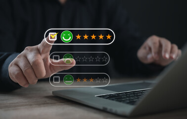 User selecting a five-star satisfaction level with a happy face icon on a digital interface,...