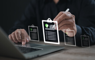 Professional interacting with holographic checklist interface, reviewing digital documents marked with green approval icons, symbolizing verified data, secure processing, and digital task validation.