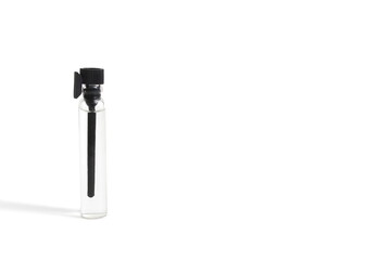 There is a perfume sample on a white background.