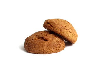 Fresh oatmeal cookies lie on a white background.	