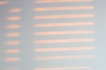 wall with window shadows at sunset