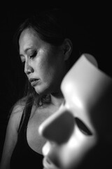 Woman Behind White Mask