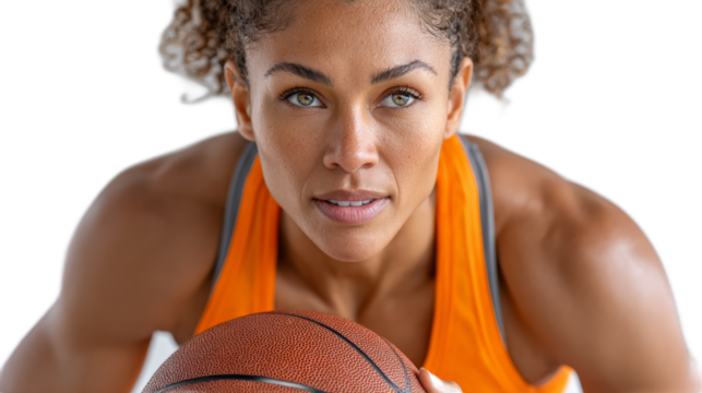 Focused Female Basketball Player: An determined woman poised and ready to dominate the court. With the basketball in her grip, her intensity and focus show unwavering dedication to the game.