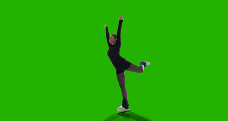 Figure skating woman on green screen background.