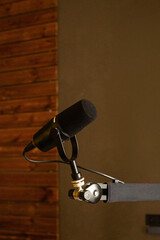black studio microphone on dark background