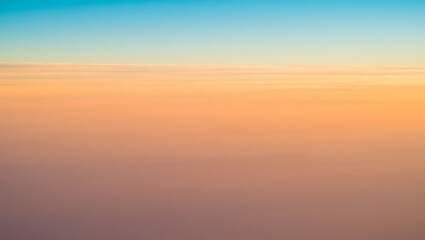 Obraz premium Aerial view of soft pastel sunset cloudscape, serene and tranquil mood, horizontal orientation