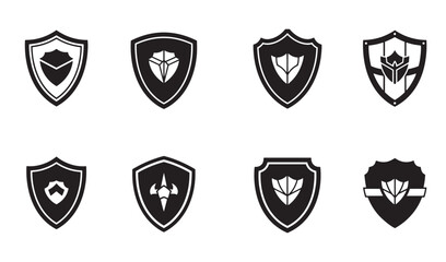 Obraz premium Set of eight black and white shield icon designs illustrating protection and security concepts