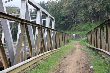 The old iron bridge next to the new iron bridge.
