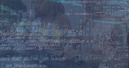 Developer in hoodie typing at laptop beside coworker in office, with coding overlay and world map