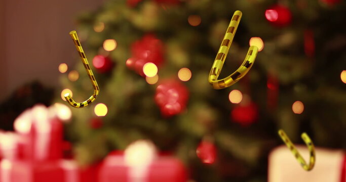 Gold-black candy cane ornaments floating in living room, tree with baubles, lights, gift boxes - Powered by Adobe