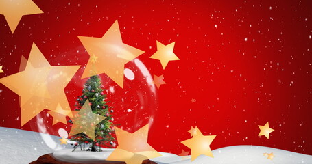 Fototapeta premium Featuring snow globe showing decorated Christmas tree in holiday scene, snowflakes, golden stars