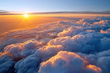 Golden sunset illuminating majestic clouds from above