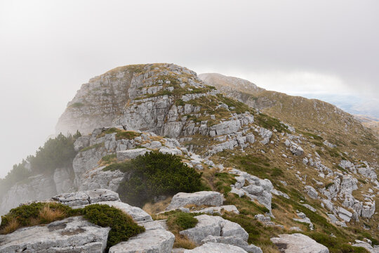 Summit ridge of Troglav peak in clouds. Dinara mountain, Bosnia and Herzegovina
