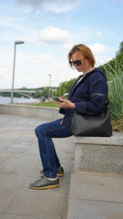 Close-up of a young woman with a phone24