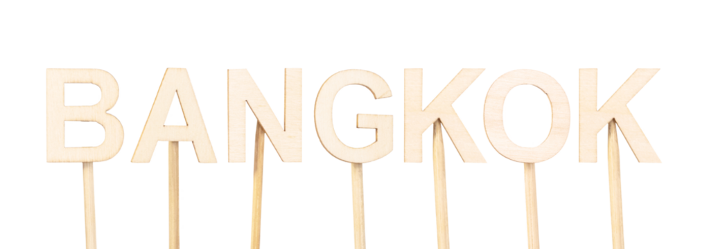 Well-spaced wooden letters writing Bangkok, capital of Thailand, in a clean and conceptual image that highlights tourism, culture and Asian modernity