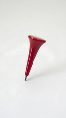 Red pointed writing tool